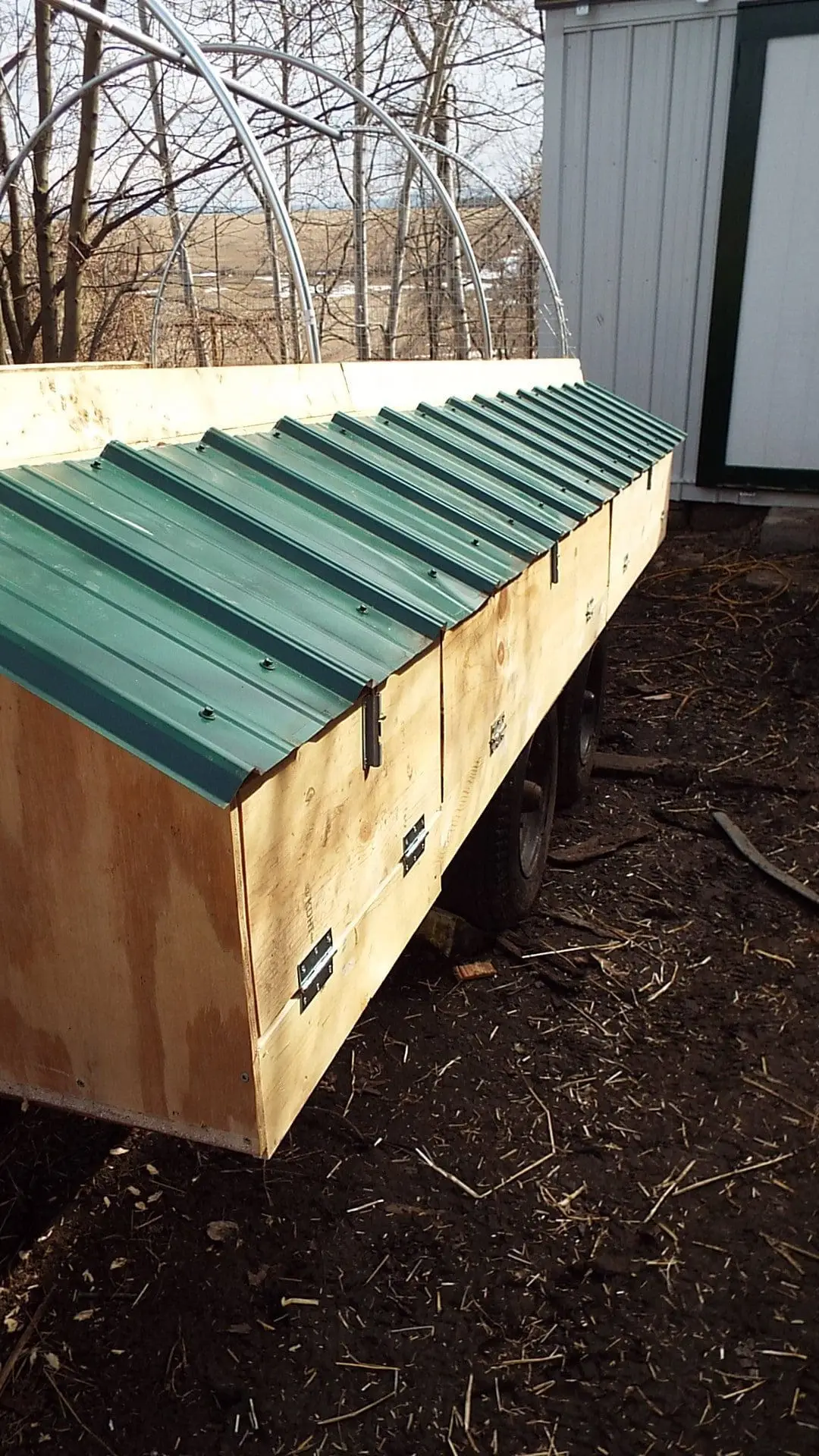 The two five foot sections on the right are the external access to the nest boxes. The two foot section on the left is a storage cabinet for egg brushes and empty egg cartons.