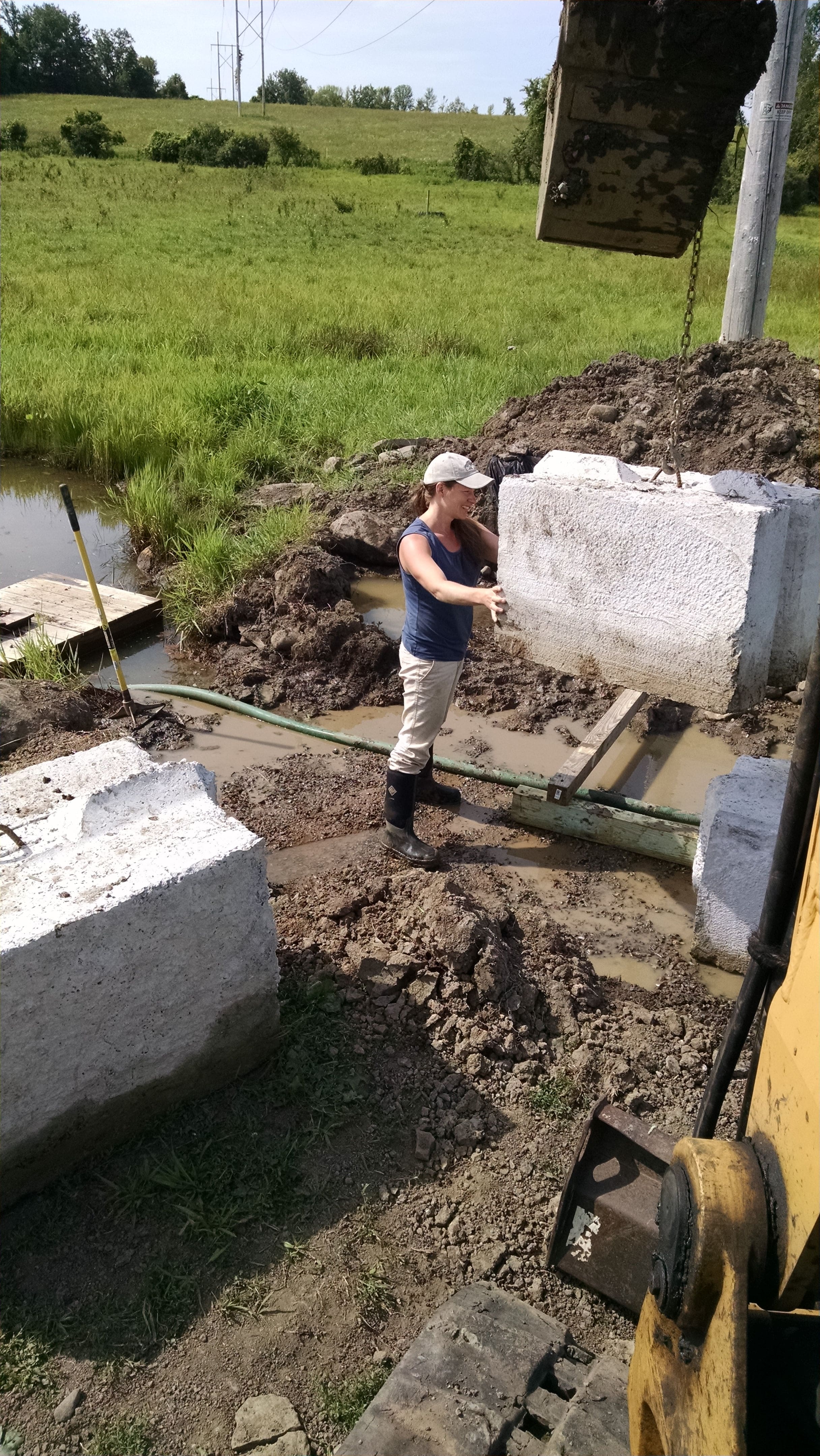 The abutments were all placed as half-sized "mafia blocks" (for those of you not from New Jersey, you might call them waste concrete blocks or ecology blocks). We backfilled with more gravel behind the blocks.