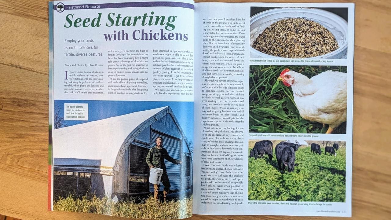 Photo of Mother Earth News opened to show an article from Wrong Direction Farm titled "Seed Starting with Chickens: Employ your birds as no-till planters for fertile, diverse pastures."